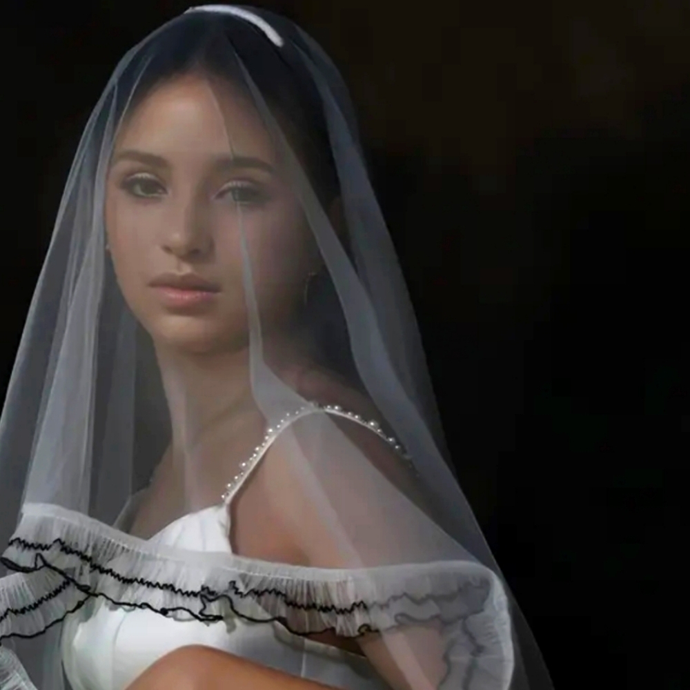 Black lace and delicate ruffle veil